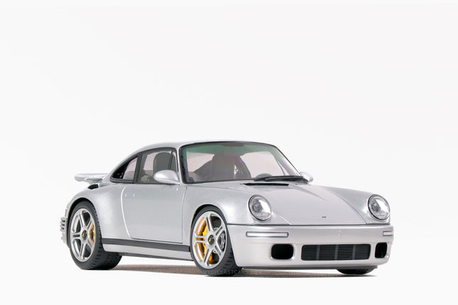 https://www.mydiecastcars.com/wp-content/uploads/2024/05/ruf-scr-silver-gt-almost-real-1w.jpg
