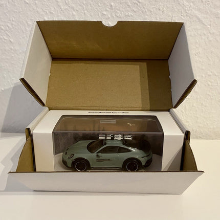 Porsche 911 Dakar 992 Ice Experience 1:43 Spark - model in opened box