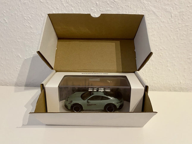 Porsche 911 Dakar 992 Ice Experience 1:43 Spark - model in opened box