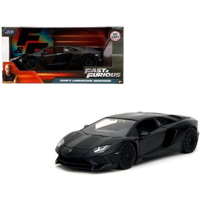 https://cdn.shopify.com/s/files/1/0504/9925/6496/files/shaws-lamborghini-aventador-matt-black-furious-7-2015-movie-fast-furious-series-124-diecast-model-car-by-jada-963045.jpg?v=1756087133