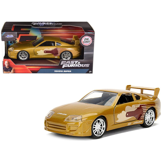 https://cdn.shopify.com/s/files/1/0504/9925/6496/files/slap-jacks-toyota-supra-gold-fast-furious-movie-132-diecast-model-car-by-jada-508889.jpg?v=1748419124