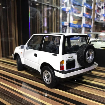 LCD Model Suzuki Vitara White 1:18 Diecast Model Car - studio product photo of the scale model