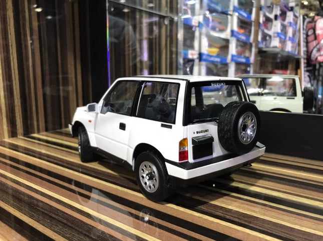 LCD Model Suzuki Vitara White 1:18 Diecast Model Car - studio product photo of the scale model