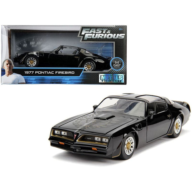 https://cdn.shopify.com/s/files/1/0504/9925/6496/files/tegos-1977-pontiac-firebird-black-fast-furious-movie-124-diecast-model-car-by-jada-980289.jpg?v=1748419487
