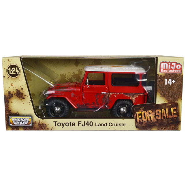 https://cdn.shopify.com/s/files/1/0504/9925/6496/files/toyota-fj40-land-cruiser-red-with-white-top-rusted-version-for-sale-series-124-diecast-model-car-by-motormax-319198.jpg?v=1748417975