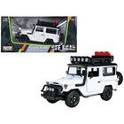 https://cdn.shopify.com/s/files/1/0504/9925/6496/files/toyota-fj40-land-cruiser-white-4x4-overlanders-series-124-diecast-model-car-by-motormax-574069.jpg?v=1748417971