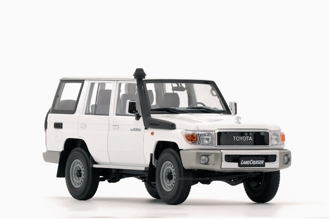https://www.mydiecastcars.com/wp-content/uploads/2024/05/toyota-landcruiser-white-almost-real-1-.jpg