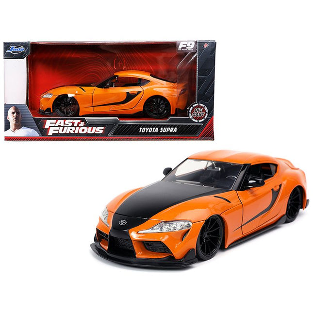 https://cdn.shopify.com/s/files/1/0504/9925/6496/files/toyota-supra-orange-with-black-stripes-fast-furious-9-f9-2021-movie-124-diecast-model-car-by-jada-596362.jpg?v=1748419233