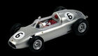 Silver vintage diecast racing model car with number 6 decals, detailed wheels, black background