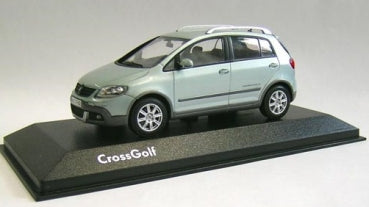 VW Cross Golf 2007 1:43 diecast model car in ice silver metallic on display stand