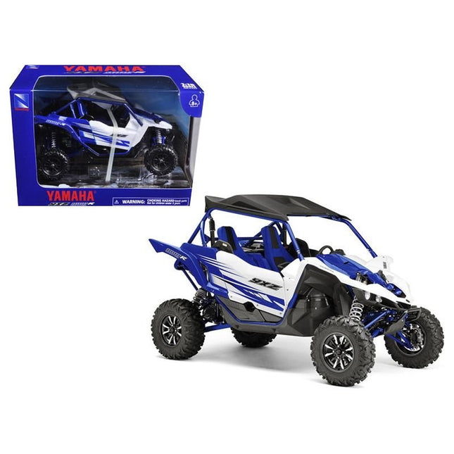 https://cdn.shopify.com/s/files/1/0504/9925/6496/files/yamaha-yxz-1000r-triple-cylinder-blue-buggy-118-diecast-model-by-new-ray-196428.jpg?v=1760624568