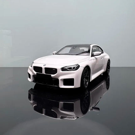Minichamps 2023 BMW M2 G87 Red 1:18 Diecast Model Car - studio product photo of the scale model