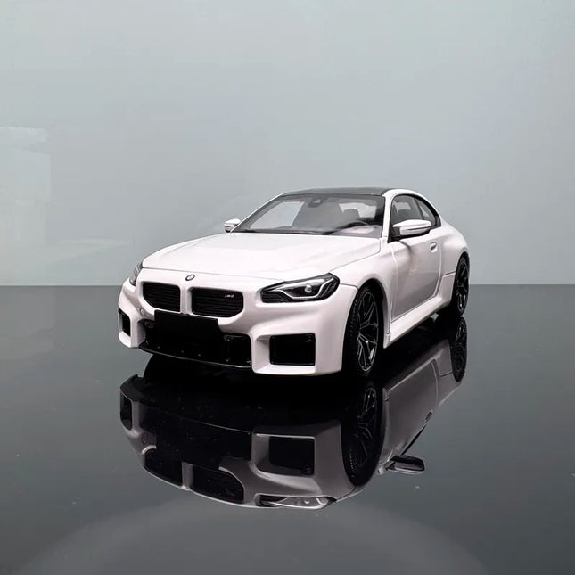 Minichamps 2023 BMW M2 G87 Red 1:18 Diecast Model Car - studio product photo of the scale model
